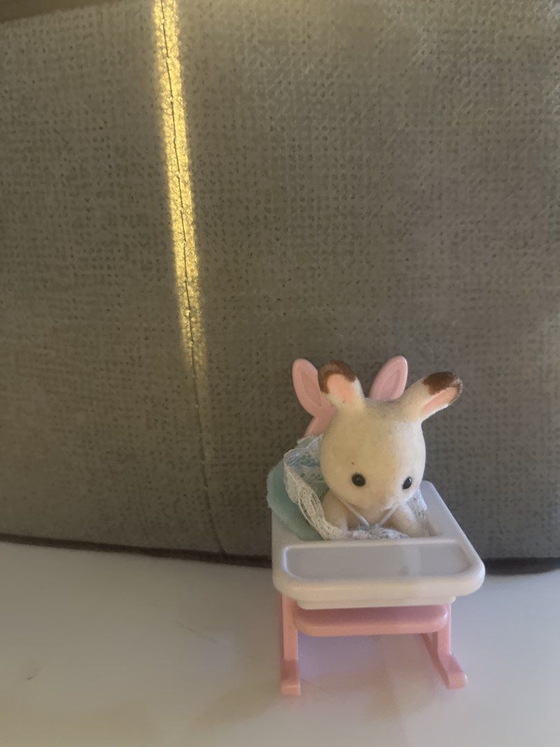 Sylvanian Families Bunny Figure with High Chair (Category: Figurines & Statues) located in Quezon City. Submitted by ilamariew312696 (Listing ID 1440326594, Image 1). Description: - Adorable Sylvanian Families bunny figure. - Comes with a pink and white high chair. - Bunny is dressed in a cute light blue outfit with lace trim. - Ideal for Sylvanian Families collectors. - Great for imaginative playtime..