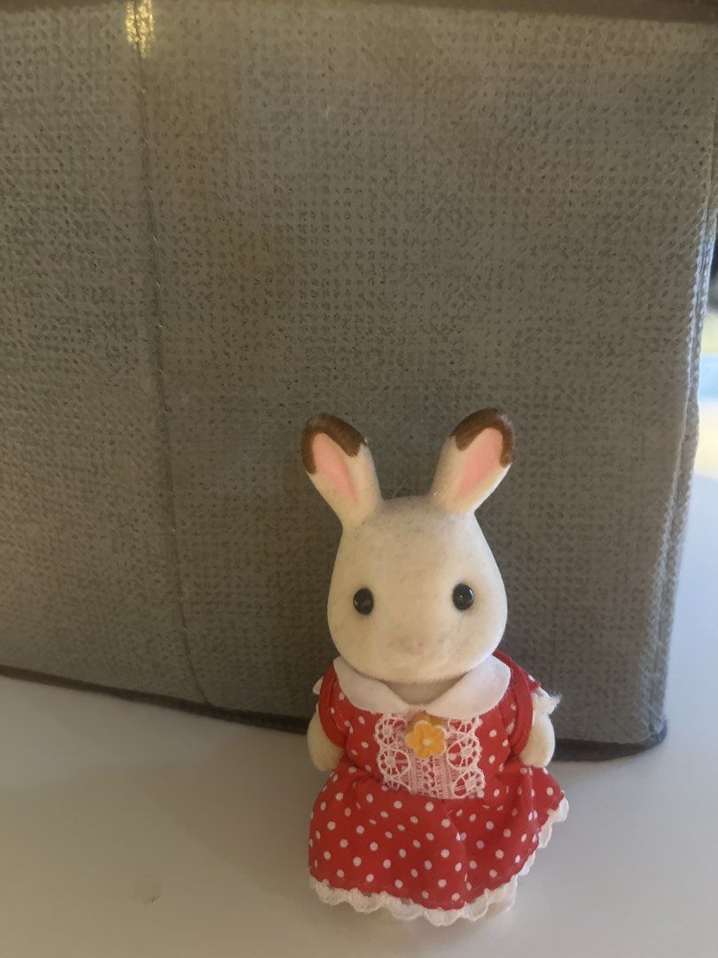 Sylvanian Families Rabbit Figure in Red Polka Dot Dress (Category: Figurines & Statues) located in Quezon City. Submitted by ilamariew312696 (Listing ID 1440326232, Image 1). Description: - Adorable Sylvanian Families rabbit figure. - Dressed in a charming red polka dot dress with white lace trim. - Features a sweet yellow flower detail on the dress. - Comes with a matching red backpack. - Ideal for Sylvanian Families collectors or imaginative pl