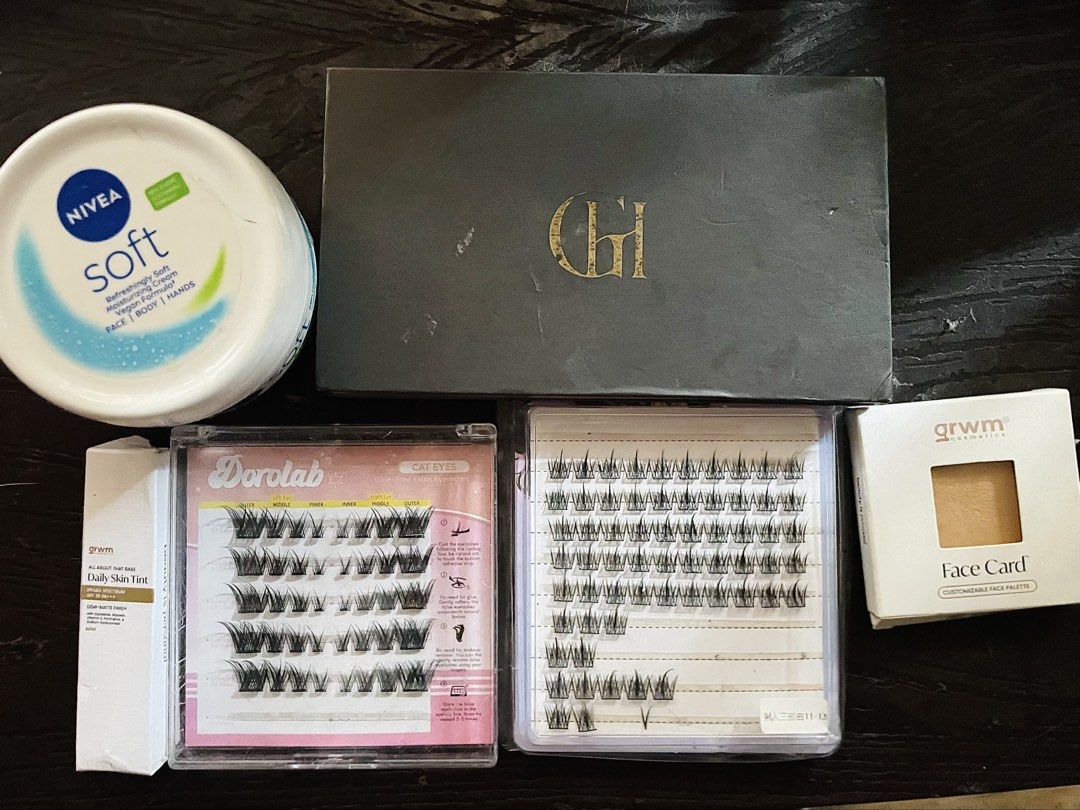 Teviant, blk, GRWM, Dorolab Makeup & Skincare Bundle (Category: Makeup) located in Manila. Submitted by cmikhaila (Listing ID 1440283257, Image 2). Description: - Discover a variety of makeup and skincare essentials. - Features Teviant cushion foundations and loose powder. - Includes blk lip jellies and tints for a pop of color. - Offers Dorolab individual lashes and other false lash options. - Comes with Nivea Soft cream tub for hydration. - Inc