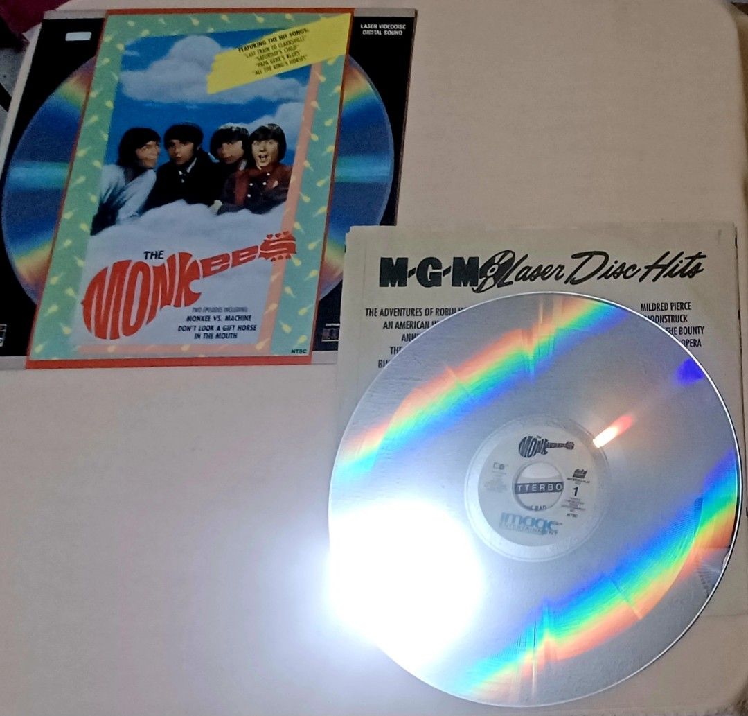 The Monkees Laserdisc "Monkee vs. Machine" & "Don't Look a Gift Horse" (Category: CDs & DVDs) located in Quezon City. Submitted by wjmae (Listing ID 1440264429, Image 3). Description: - The Monkees Laserdisc featuring two classic episodes: 'Monkee vs. Machine' and 'Don't Look a Gift Horse in the Mouth'. - Includes hit songs such as 'Last Train to Clarksville' and 'Papa Jean's Blues'. - NTSC format. - Approximate runtime of 40 minutes. - A must-ha
