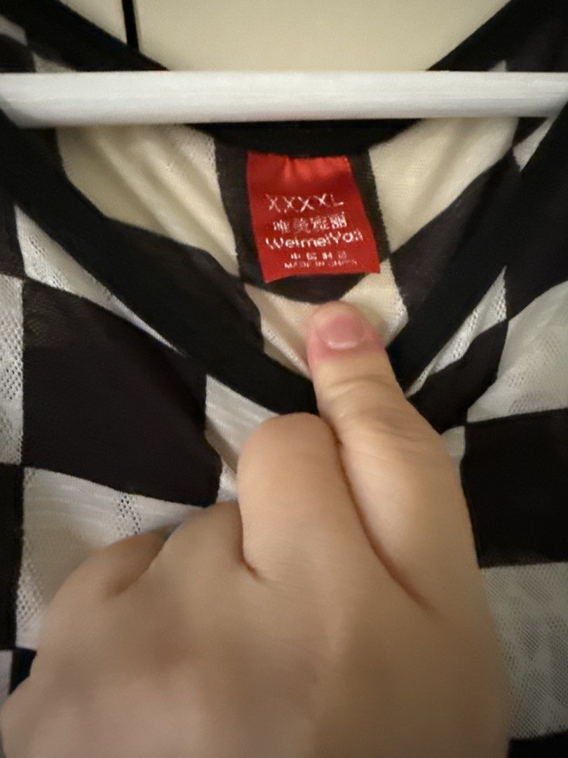 This is a black and white checkered, short-sleeved blouse (Category: Shirts) located in Imus. Submitted by avebethpreloved (Listing ID 1440367642, Image 2). Description: Thin fabric.