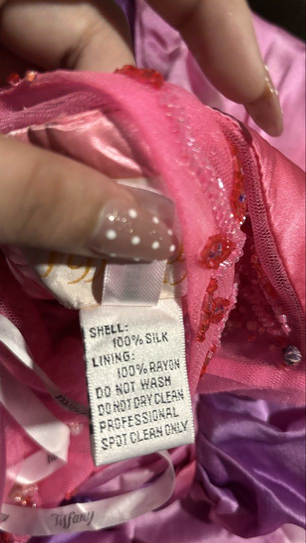 RARE TIFFANY HALTER BEADED DRESS (Category: Evening dresses & gowns) located in Ozamiz City. Submitted by franchingkang (Listing ID 1440315728, Image 3). Description: - Used once - Size 10 - Halter neck with intricate beading and sequins - Flowing pink and purple satin skirt - 100% silk shell, 100% rayon lining - Has slit - Ideal for formal events.