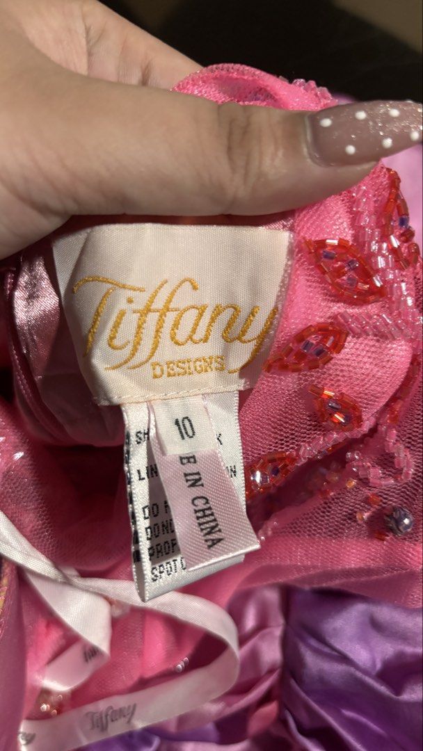 RARE TIFFANY HALTER BEADED DRESS (Category: Evening dresses & gowns) located in Ozamiz City. Submitted by franchingkang (Listing ID 1440315728, Image 2). Description: - Used once - Size 10 - Halter neck with intricate beading and sequins - Flowing pink and purple satin skirt - 100% silk shell, 100% rayon lining - Has slit - Ideal for formal events.