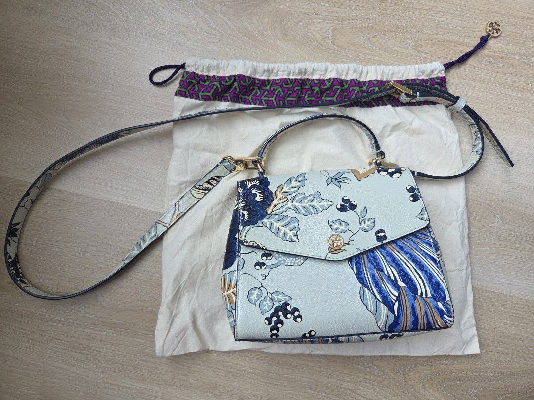 Tory Burch Robinson Satchel (Category: Luxury Bags & Wallets) located in Cebu City. Submitted by memcy (Listing ID 1440217435, Image 1). Description: Tory Burch Robinson Small Top-Handle Satchel in a light blue floral saffiano leather In good condition, no stains, no scratches, a very small of peeling, and subtle yellowing, barely noticeable pls see flaw in the last photo.