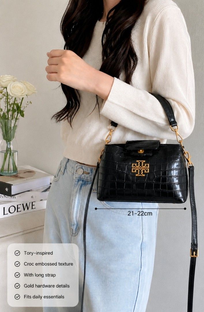 Tory-inspired Croc Embossed Bag (Category: Luxury Bags & Wallets) located in Quezon City. Submitted by styledinframes (Listing ID 1440295378, Image 1). Description: 🖤 Tory-inspired Croc Embossed Bag 🖤 ✨ Elegant structured silhouette ✨ Croc embossed texture with gold hardware ✨ Includes long strap ✨ Classy everyday bag that elevates any outfit 🎀 Comes with detachable strap Perfect for office, brunch dates, and quiet luxury fits ☕✨.