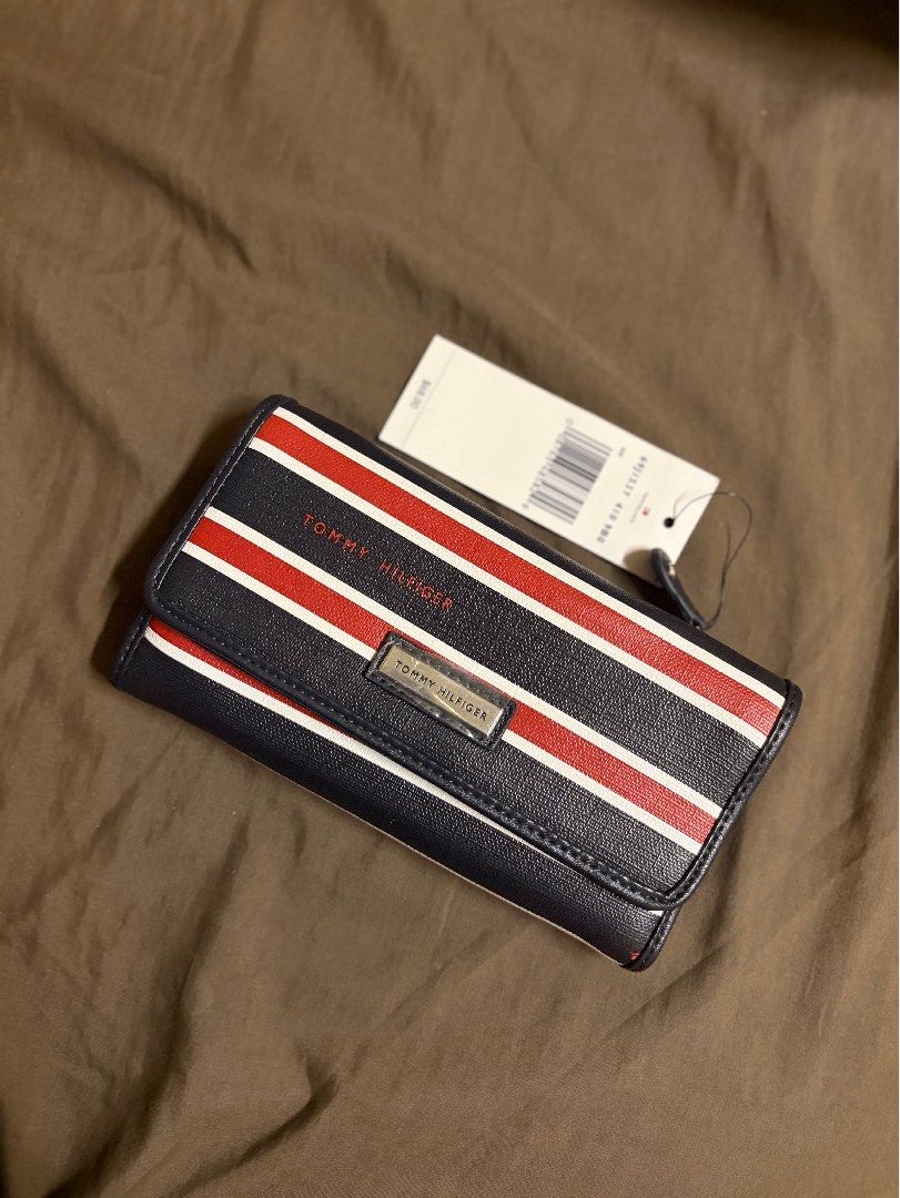 Tri-fold Tommy Hilfiger Wallet with Tag (Category: Wallets & Card holders) located in Paranaque City. Submitted by czarinamatias (Listing ID 1440338997, Image 1). Description: Brand new from US, with tag no box Price is negotiable.