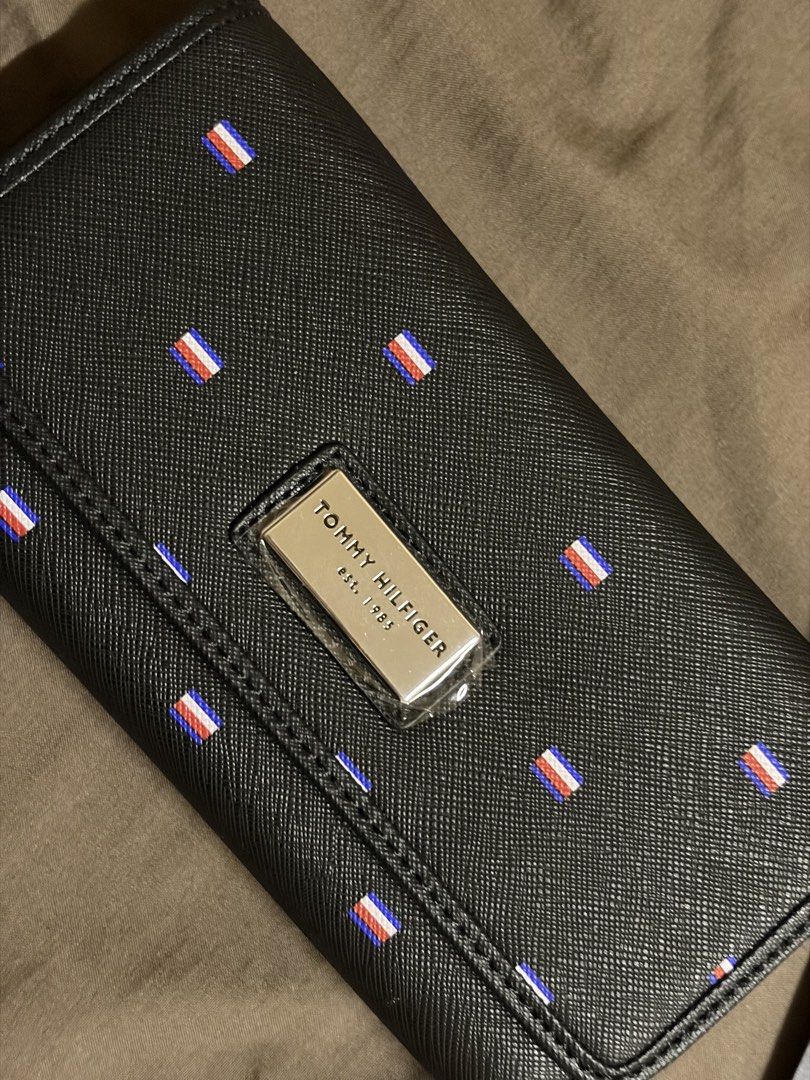 Tri-fold Tommy Hilfiger wallet with tag (Category: Wallets & Card holders) located in Paranaque City. Submitted by czarinamatias (Listing ID 1440339650, Image 1). Description: Brand new from US, with tag no box Price is negotiable.