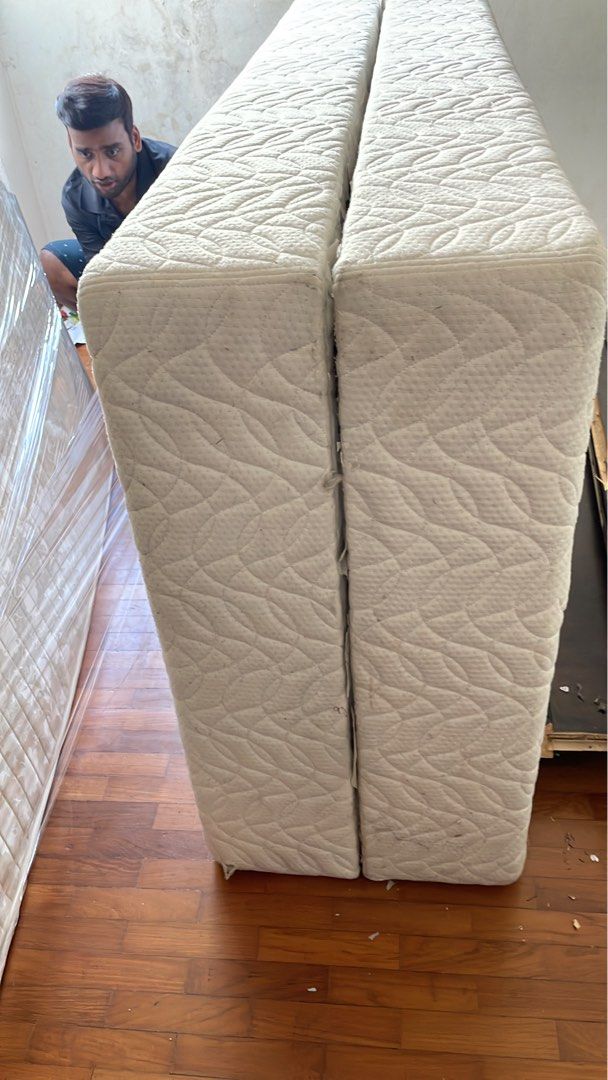 Two Single divan frames (Category: Bed Frames & Mattresses) located in Singapore. Submitted by starwr (Listing ID 1440286843, Image 1). Description: - White with quilted pattern - Pictured joined together - Suitable for guest room or kids' room - Pickup only.