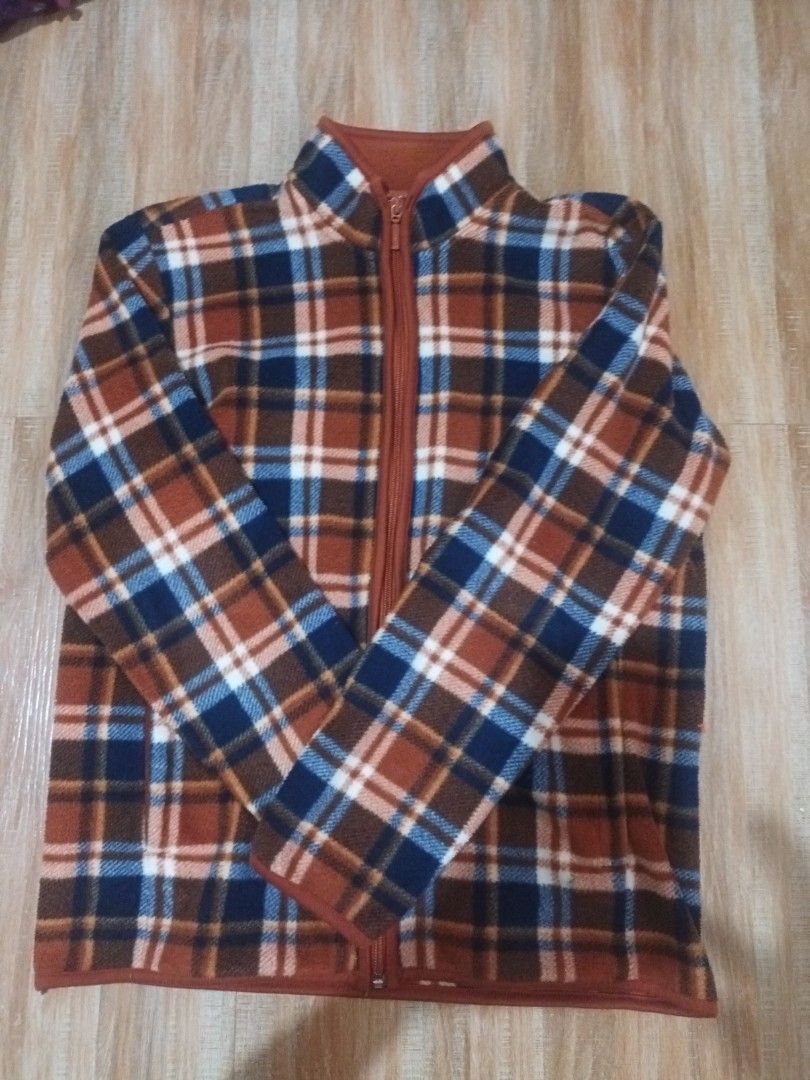 Uniqlo Plaid Fleece Full Zip Jacket (Category: Coats, Jackets and Outerwear) located in Paranaque City. Submitted by vanessa0214 (Listing ID 1440217577, Image 1). Description: - Cozy Uniqlo fleece jacket - Classic plaid pattern (brown, blue, white) - Full-zip closure - Stand-up collar for extra warmth - Perfect for layering in cooler weather - Comfortable and stylish for everyday wear.