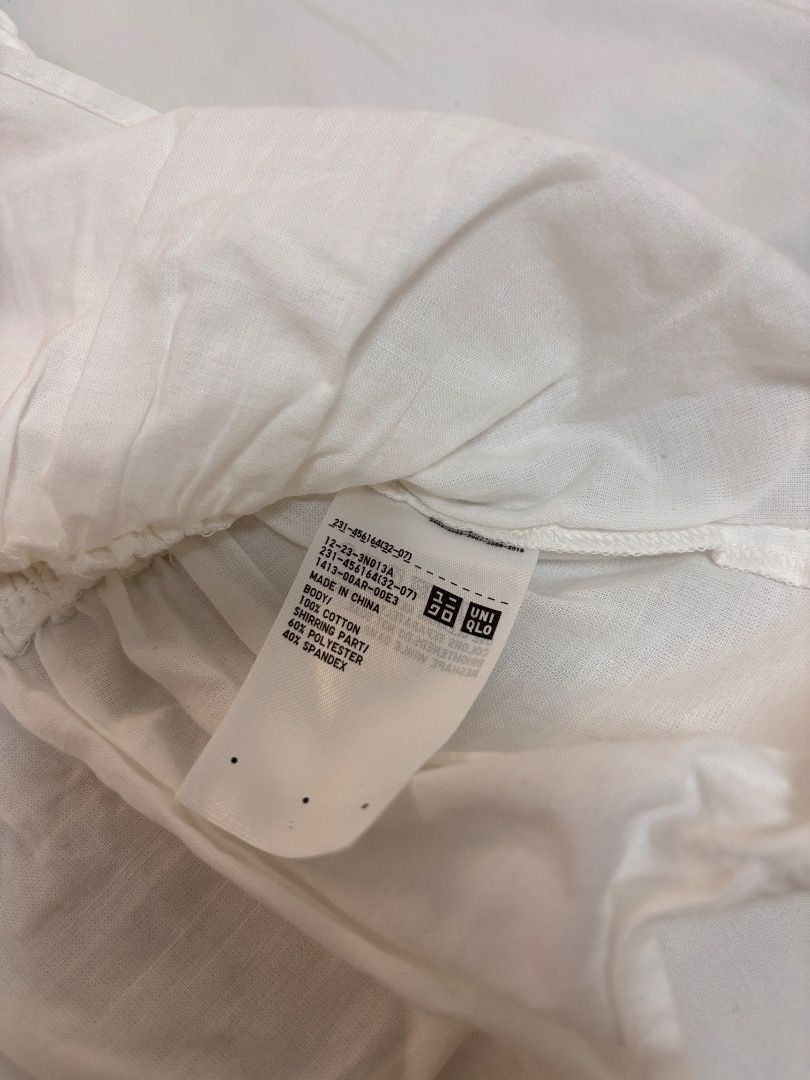 Uniqlo Sleeveless White Top (Category: Sleeveless) located in Antipolo. Submitted by dddeclutter (Listing ID 1440316045, Image 2). Description: Uniqlo Sleeveless White Top Size: Small Dimensions: 26cm W x 40cm L RFS: Decluttering / Items are not in use anymore Price: 500.