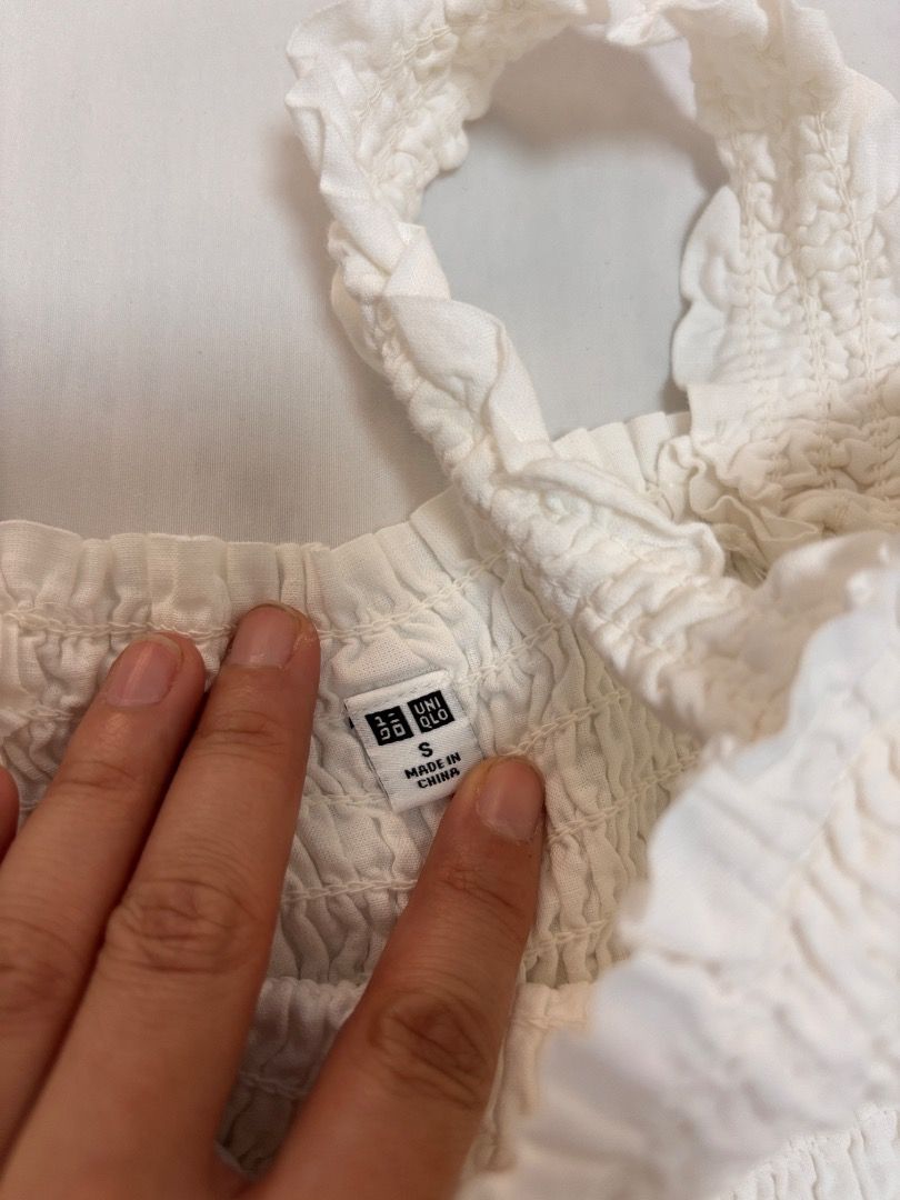 Uniqlo Sleeveless White Top (Category: Sleeveless) located in Antipolo. Submitted by dddeclutter (Listing ID 1440316045, Image 3). Description: Uniqlo Sleeveless White Top Size: Small Dimensions: 26cm W x 40cm L RFS: Decluttering / Items are not in use anymore Price: 500.