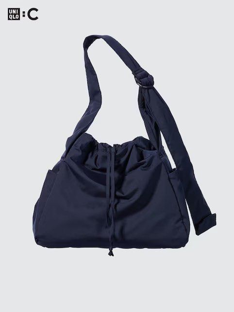 UNIQLO SOFT PUFFY SHOULDER BAG (NAVY) (Category: Shoulder Bags) located in Manila. Submitted by aerimisu (Listing ID 1440286648, Image 1). Description: .𖥔 ݁ ˖ uniqlo soft puffy shoulder bag in navy very spacious, can fit 15” laptop + ipad + 38oz tumbler rfs: decluttering loc: manila.