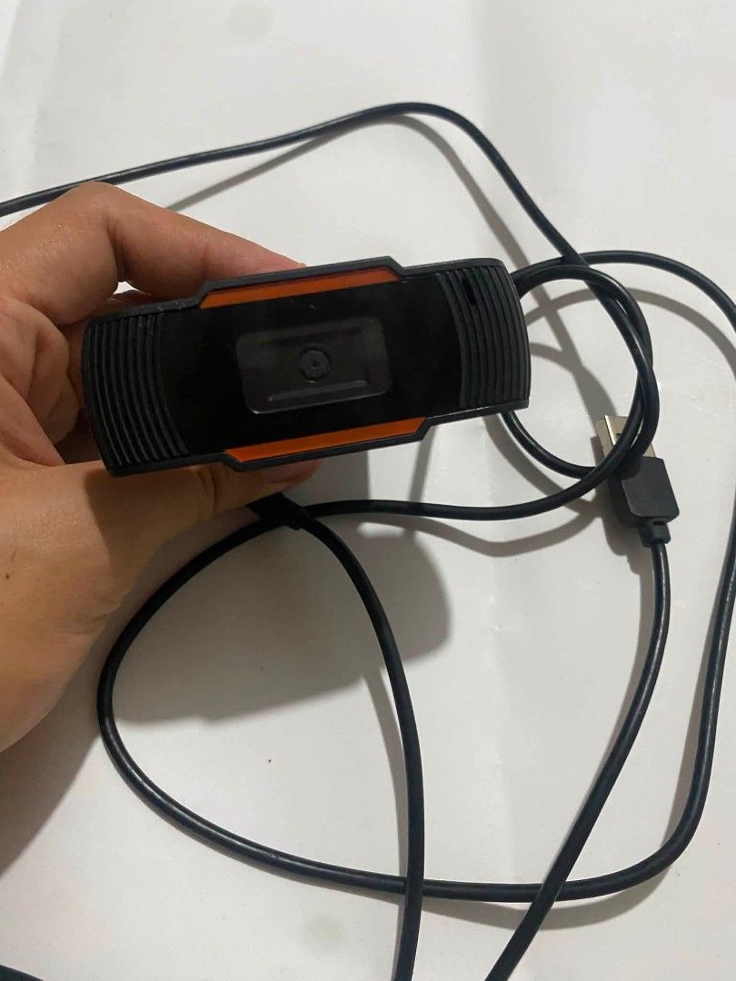 USB Webcam with Built-in Microphone (Category: Webcams) located in Cainta. Submitted by bmeros19 (Listing ID 1440273541, Image 1). Description: - Plug and play USB webcam - Built-in microphone for clear audio - Ideal for video calls and online meetings - Compatible with most operating systems - Simple and functional design.