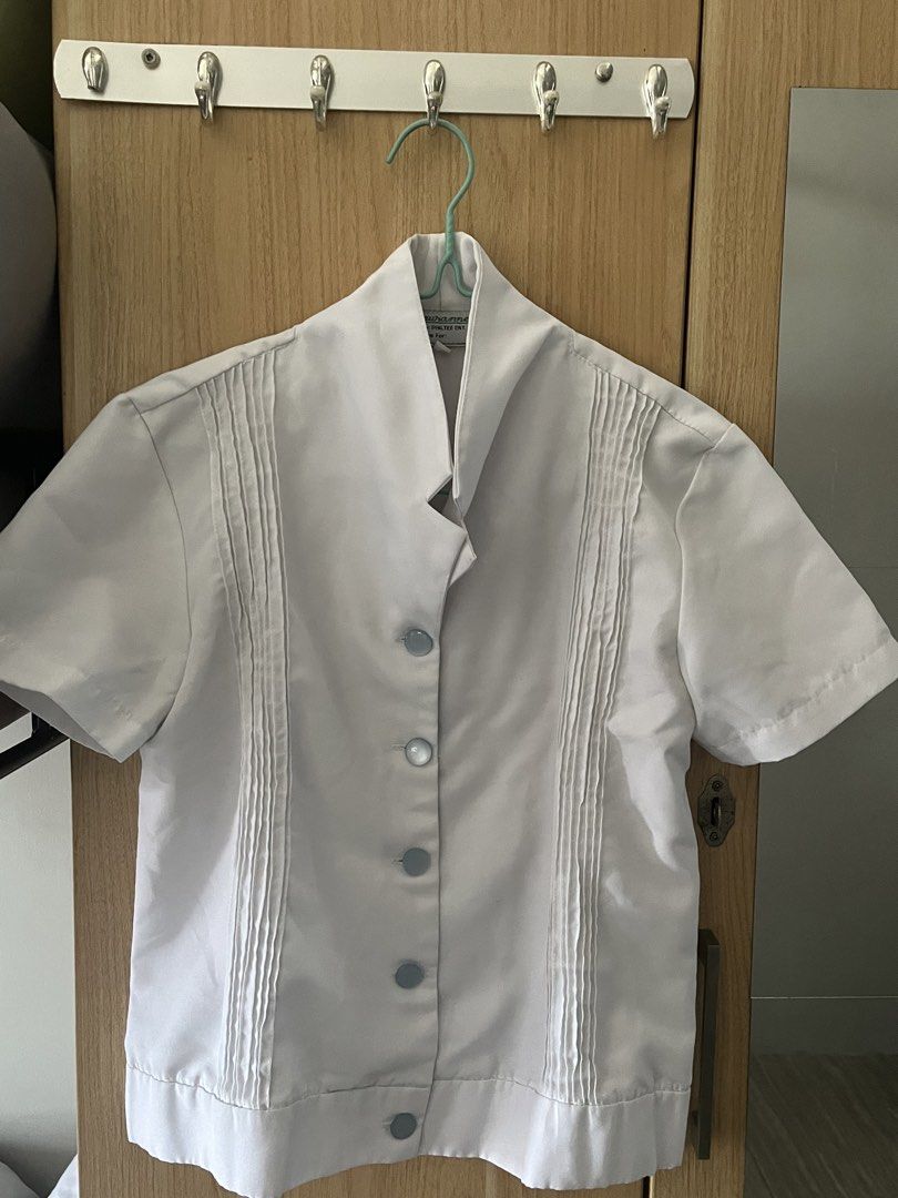 UST Med Type A Set (Category: Blouses) located in Manila. Submitted by eli555 (Listing ID 1440255935, Image 1). Description: 3 pairs Php 600 per pair (blouse & skirt) Can do meetup around UST Issue: Rust stain on the hook of the skirt which normally happens with use. .