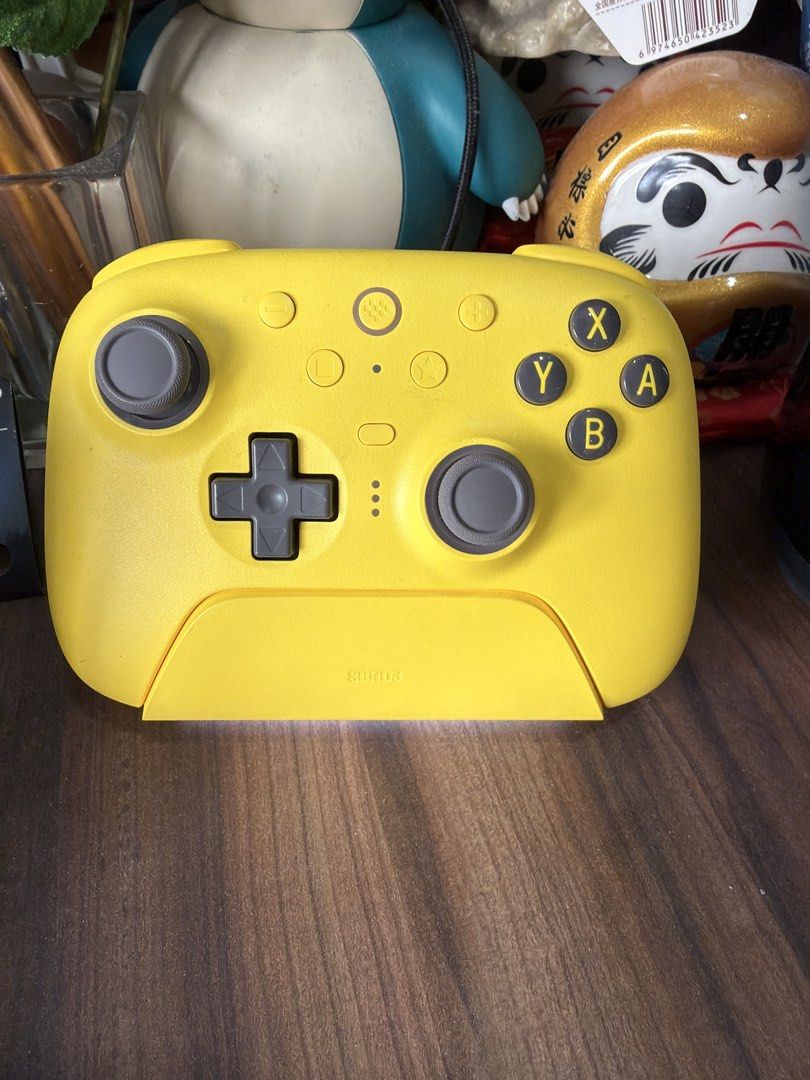 Various Controller (Category: Controllers) located in Singapore. Submitted by monkey_d_luffy (Listing ID 1440247537, Image 1). Description: 8bitdo Yellow Controller with stand - $70 PS5 Dual Sense Controller black -$70 PS5 DualSense Astrobot Limited Edition Controller with box - $120 Razer Wolverine Pro PS edition - $100 (can only use when connected via cable, battery got issue).