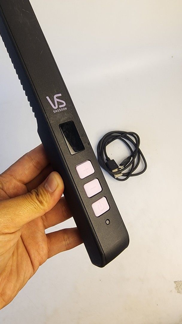 Vidal Sassoon Heated Comb Straightener with USB Cable (Category: Hair) located in Baguio. Submitted by chiechie1234 (Listing ID 1440263727, Image 2). Description: - Heated comb for effortless hair straightening - Sleek black color - Includes USB charging cable for convenience - Features a small display screen and three intuitive buttons - Compact and portable design, perfect for travel or quick touch-ups - Get smooth, sleek hair anytime, anywhere