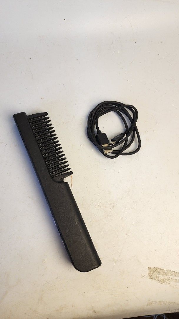 Vidal Sassoon Heated Comb Straightener with USB Cable (Category: Hair) located in Baguio. Submitted by chiechie1234 (Listing ID 1440263727, Image 1). Description: - Heated comb for effortless hair straightening - Sleek black color - Includes USB charging cable for convenience - Features a small display screen and three intuitive buttons - Compact and portable design, perfect for travel or quick touch-ups - Get smooth, sleek hair anytime, anywhere