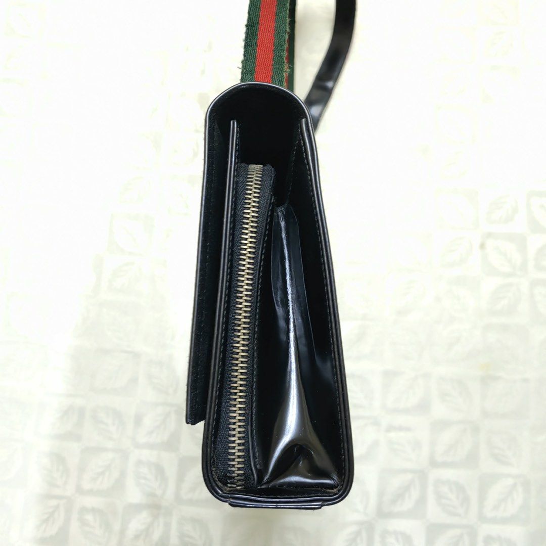 Vintage Gucci Black Leather Shoulder Bag with Web Strap (Category: Luxury Bags & Wallets) located in Quezon City. Submitted by blessed.gem (Listing ID 1440326196, Image 3). Description: - Vintage Authentic Gucci black leather shoulder bag Model/Identification: - model number is 001/3248/R 1514/01/00. The accompanying tag describes it as a “SHOULDER STRAP HAND-BAGS” in “MASTER CALF-BLACK”. Description: This is a vintage, structured black leather s