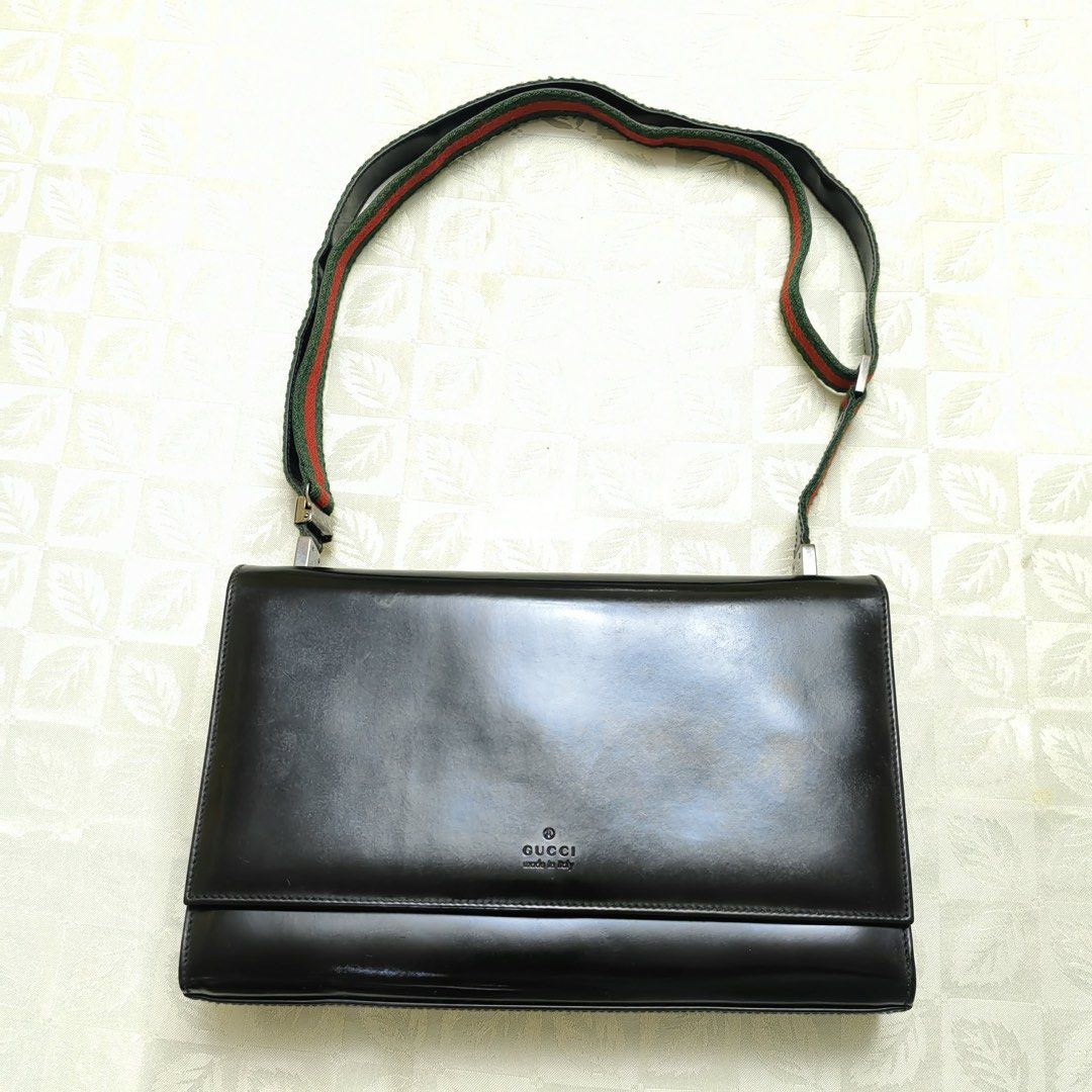 Vintage Gucci Black Leather Shoulder Bag with Web Strap (Category: Luxury Bags & Wallets) located in Quezon City. Submitted by blessed.gem (Listing ID 1440326196, Image 2). Description: - Vintage Authentic Gucci black leather shoulder bag Model/Identification: - model number is 001/3248/R 1514/01/00. The accompanying tag describes it as a “SHOULDER STRAP HAND-BAGS” in “MASTER CALF-BLACK”. Description: This is a vintage, structured black leather s