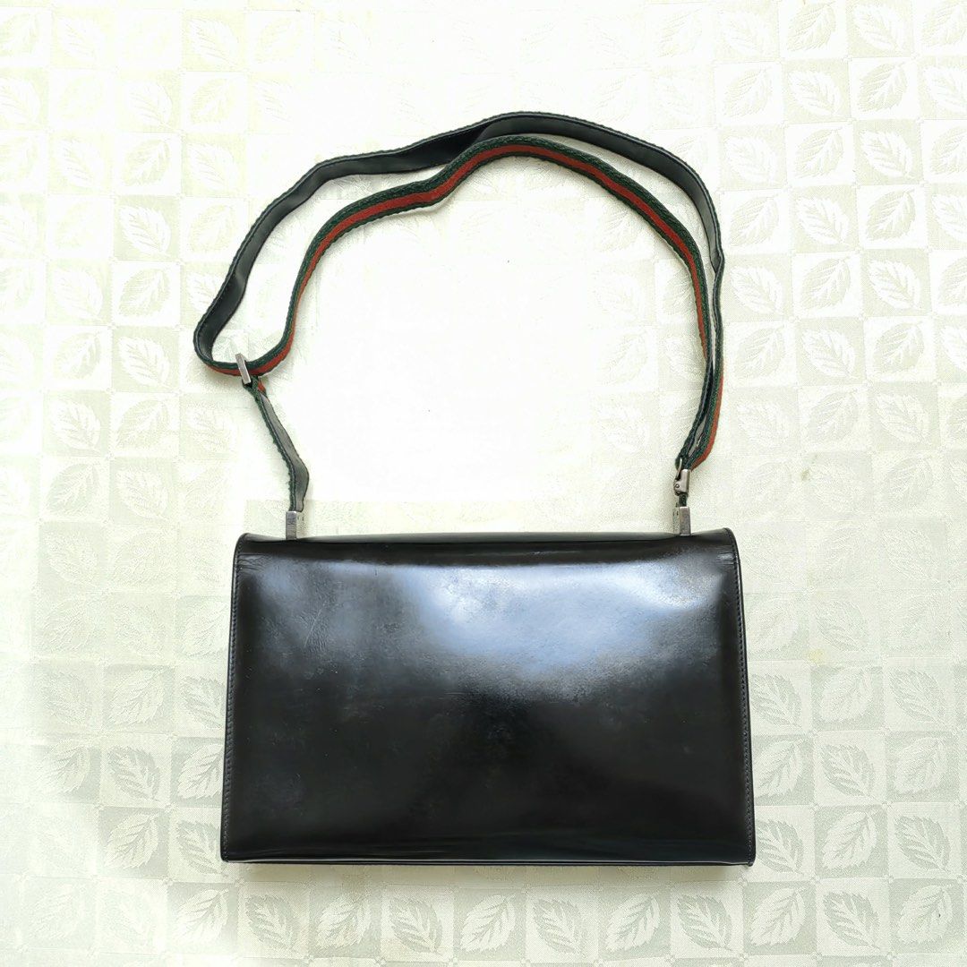 Vintage Gucci Black Leather Shoulder Bag with Web Strap (Category: Luxury Bags & Wallets) located in Quezon City. Submitted by blessed.gem (Listing ID 1440326196, Image 1). Description: - Vintage Authentic Gucci black leather shoulder bag Model/Identification: - model number is 001/3248/R 1514/01/00. The accompanying tag describes it as a “SHOULDER STRAP HAND-BAGS” in “MASTER CALF-BLACK”. Description: This is a vintage, structured black leather s