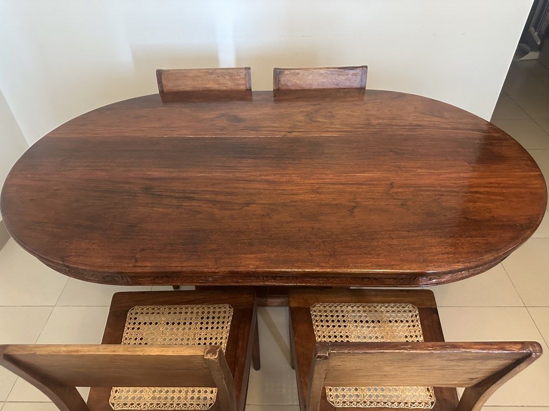 Vintage Solid Wood Dining Set (Category: Tables & Sets) located in Quezon City. Submitted by abetano (Listing ID 1440261610, Image 2). Description: Vintage solid wood dining set in very good condition - Solid wood oval dining table - 4 solid wood/rattan chairs - Sold as a complete set RFS: Moving out.