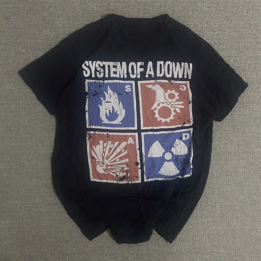 Vintage System Of A Down Hazard Official T-shirt (Category: Tshirts & Polo Shirts ) located in Los Banos. Submitted by adothrift (Listing ID 1440259908, Image 2). Description: Vintage System Of A Down Hazard Band Official T-shirt Size: M-L Dimensions: Width - 20 Length - 26.