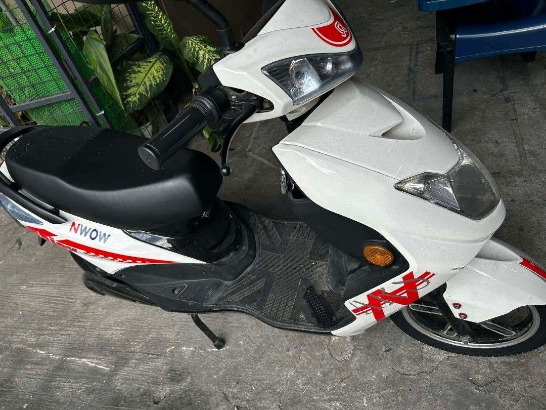 White NWOW Electric Scooter (Category: Motorbikes for Sale) located in Taguig. Submitted by jla2005 (Listing ID 1440310340, Image 1). Description: - White NWOW electric scooter - Features stylish red accents - Equipped with a kickstand - Ready for its next owner -lady owned unit -price is negotiable -only used every Thursday RFS: funds will be used for chemotherapy.