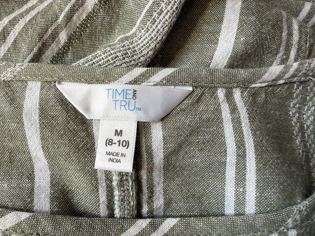 TIME & TRU Woven blouse (Category: Blouses) located in Malabon City. Submitted by everythinggoeson (Listing ID 1440271002, Image 2). Description: Time & Tru olive green blouse with side tie medium on tag but fits large frame.