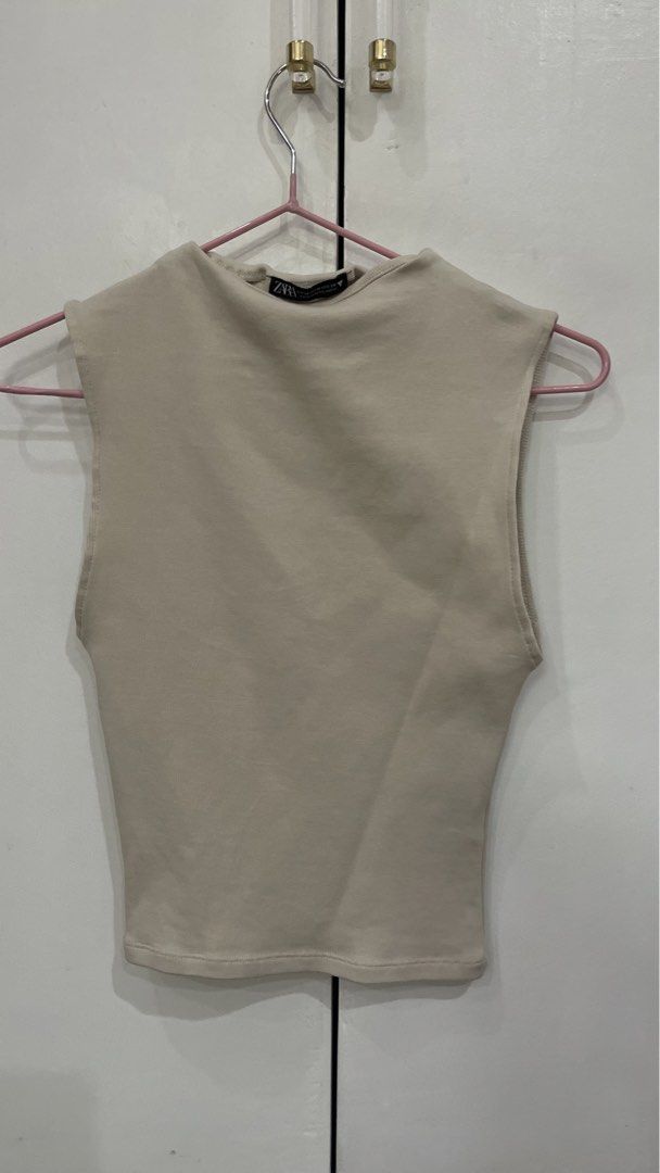 Zara Beige Sleeveless Mock Neck Top (Category: Sleeveless) located in Quezon City. Submitted by kiwis_closet (Listing ID 1440245934, Image 2). Description: - Zara beige sleeveless top - Medium.