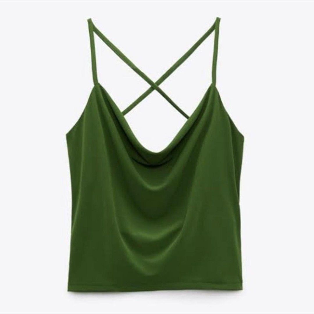 Zara Green Cowl Neck Spaghetti Strap Cami Top (Category: Sleeveless) located in Quezon City. Submitted by samcas (Listing ID 1440200332, Image 1). Description: Chic green cami top with cowl neck and criss-cross back straps. Versatile for day or night..