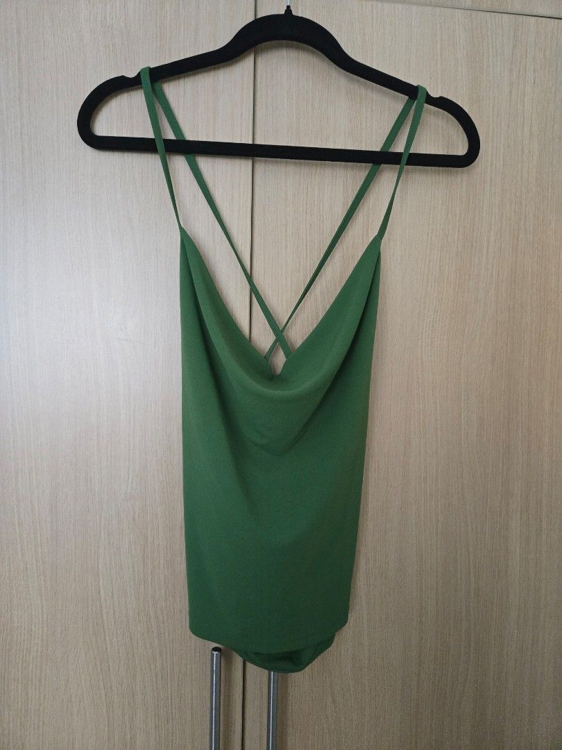 Zara Green Cowl Neck Spaghetti Strap Cami Top (Category: Sleeveless) located in Quezon City. Submitted by samcas (Listing ID 1440200332, Image 2). Description: Chic green cami top with cowl neck and criss-cross back straps. Versatile for day or night..