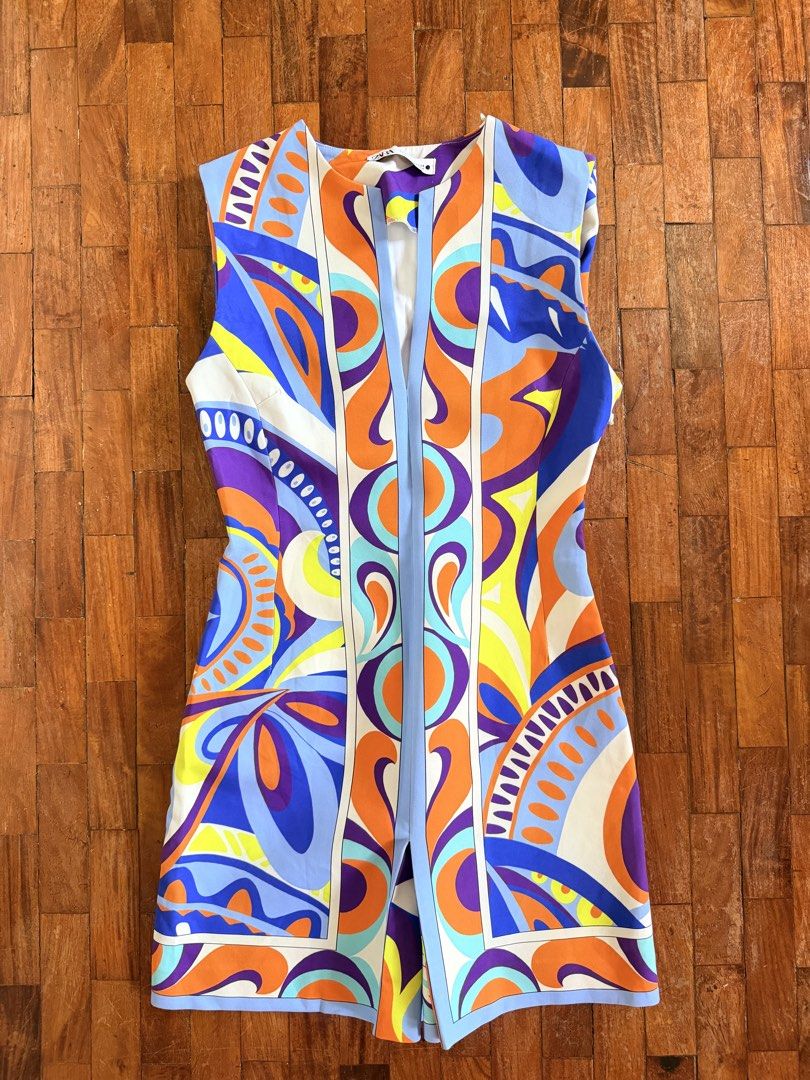 Zara Print Sleeveless Mini Dress (Category: Dresses) located in Quezon City. Submitted by lovedbycnm (Listing ID 1440336556, Image 1). Description: - Funky sleeveless mini dress - Bold psychedelic print - V-neckline - Front zip closure - Vibrant colors and abstract patterns - Ideal for parties or a night out - Sleeveless design for warm weather.