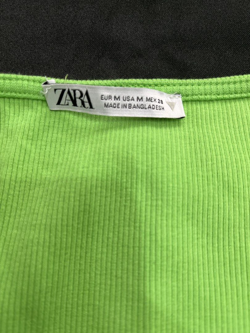 Zara Ribbed Ruched Drawstring Crop Top Lime Green (Category: Sleeveless) located in Pasig City. Submitted by ___she___ (Listing ID 1440242254, Image 2). Description: - Bright lime green ribbed crop top from Zara - Flattering scoop neckline - Short sleeves - Adjustable ruched drawstring detail at the front - Perfect for a casual and stylish look.