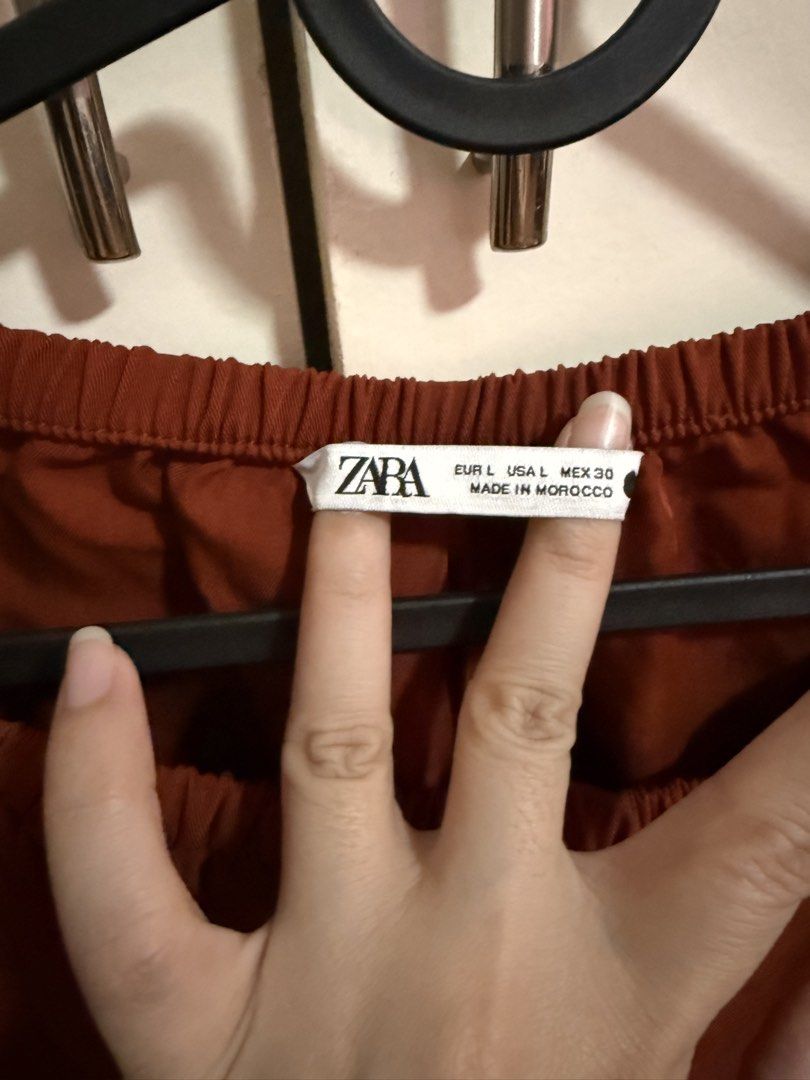 ZARA Wide Leg Pants - Rust Orange - Size L (Category: Other Bottoms) located in Antipolo. Submitted by patkar (Listing ID 1440274992, Image 2). Description: - ZARA Rust Orange Wide Leg Pants - Comfortable elastic waistband - Made in Morocco - Perfect for casual or dressed-up outfits - Easy to style and very versatile Bought in UK. Never worn.