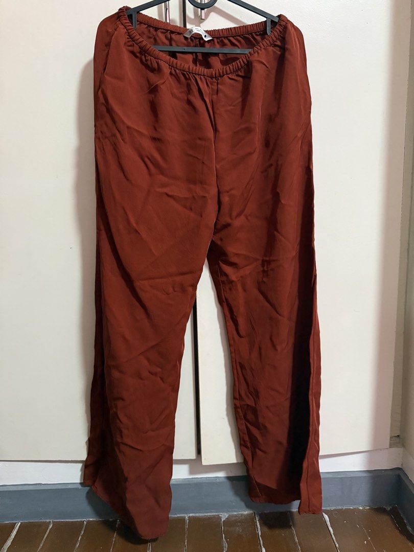 ZARA Wide Leg Pants - Rust Orange - Size L (Category: Other Bottoms) located in Antipolo. Submitted by patkar (Listing ID 1440274992, Image 1). Description: - ZARA Rust Orange Wide Leg Pants - Comfortable elastic waistband - Made in Morocco - Perfect for casual or dressed-up outfits - Easy to style and very versatile Bought in UK. Never worn.