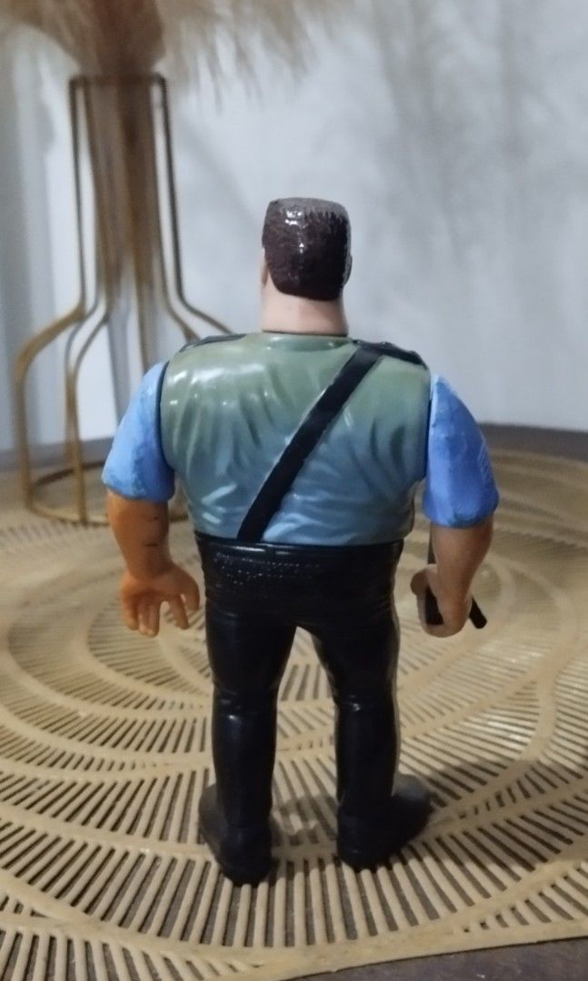 1990 WWF Hasbro Big Boss Man action figure (Category: Action & Battle Toys) located in Manila. Submitted by ventajetoyz625 (Listing ID 1439357325, Image 3). Description: - Vintage action figure - Features a man with sunglasses - Green vest and black pants - Blue shirt - Collectible item - With minimal chipped paint - What you see is what you get.