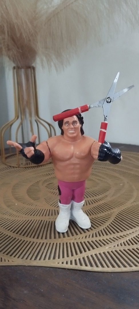 1990 WWF Hasbro Brutus "The Barber" Beefcake with Scissors (Category: Vintage Collectibles) located in Manila. Submitted by ventajetoyz625 (Listing ID 1440439754, Image 1). Description: - Vintage wrestling action figure - Collectible item - Glued left arm to hold steady the scissors - Customized accessories - "Gimmick" moderately working - With minimal chipped paint - What you see is what you get.