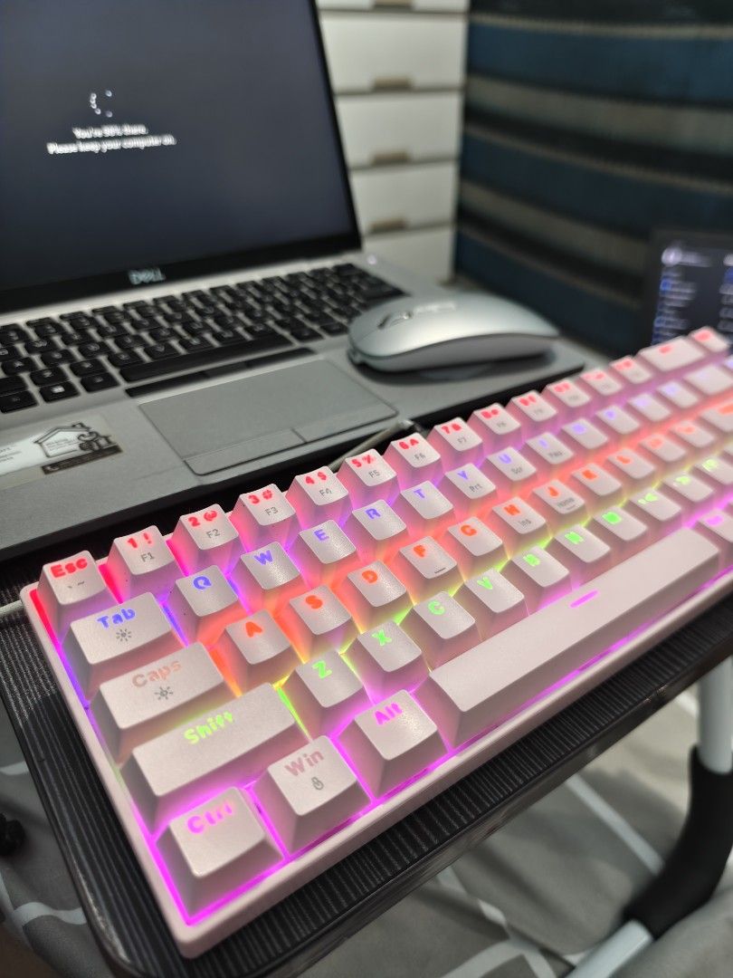 60% RGB Mechanical Keyboard (Category: Computer Keyboard) located in Taguig. Submitted by wiltech016 (Listing ID 1440404084, Image 2). Description: Selling my lightly used GOOJODOQ RGB Mechanical Keyboard (Pink). This is a fantastic, budget-friendly mechanical keyboard packed with premium features. It’s perfect for clearing up desk space without sacrificing the tactile typing experience. Condition: Used but in excellent, fully functional conditio