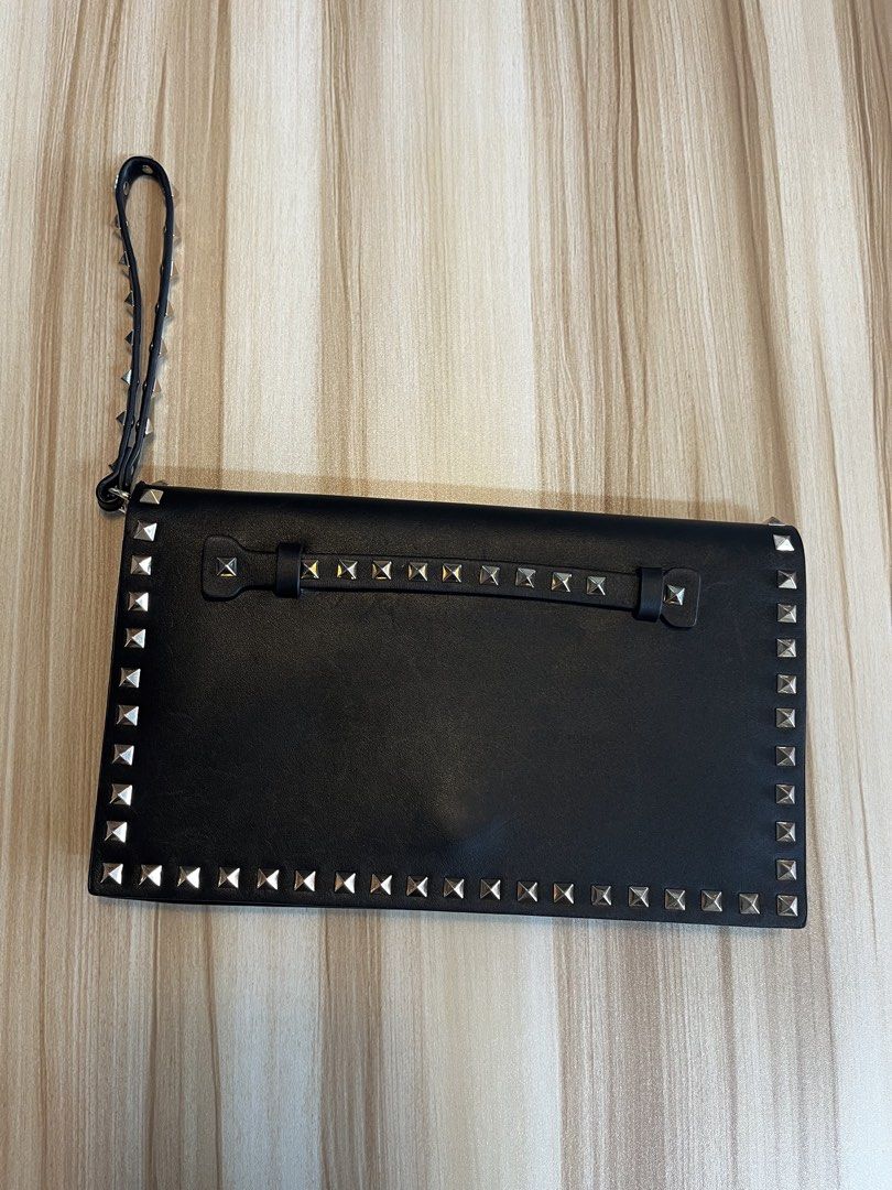 ValentinoGaravani (Category: Luxury Bags & Wallets) located in Manila. Submitted by Lenlen23 (Listing ID 1439829079, Image 1). Description: - Authentic Saint Laurent Sac De Jour Nano bag - Color: Navy blue - Includes: Detachable shoulder strap, dust bag, and authenticity cards - Hardware: Gold-toned - Closure: Zip - Design: Classic, versatile style - Features top handle - Lined interior.