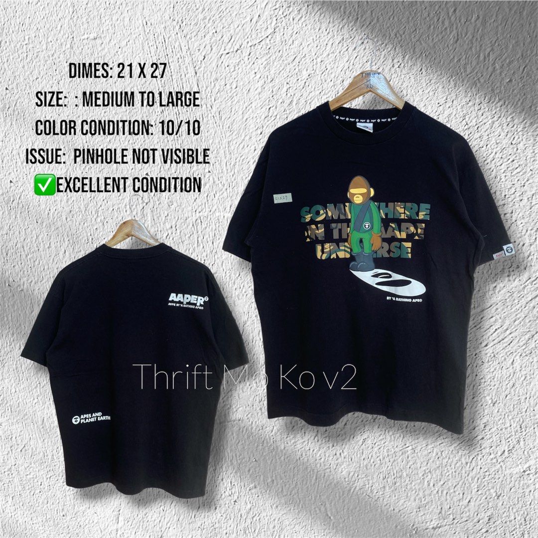 Aape By A Bathing Ape Graphic T-Shirt (Category: Tshirts & Polo Shirts ) located in Santiago. Submitted by mfdthriftstore (Listing ID 1440457435, Image 1). Description: - Black Aape T-shirt - Cool graphic print - Size: Medium (fits Medium to Large) - Ideal for casual wear.
