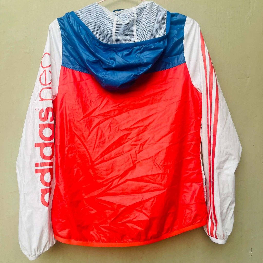 Adidas Neo Windbreaker Jacket Size M (Category: Coats, Jackets and Outerwear) located in Bulacan. Submitted by fenph2021 (Listing ID 1440500790, Image 2). Description: - Adidas Neo color block windbreaker - Size: Medium (M) - Colors: White, blue, and red - Features Adidas branding on the sleeve - Inner mesh lining for comfort - Ideal for light outdoor activities and casual styling.