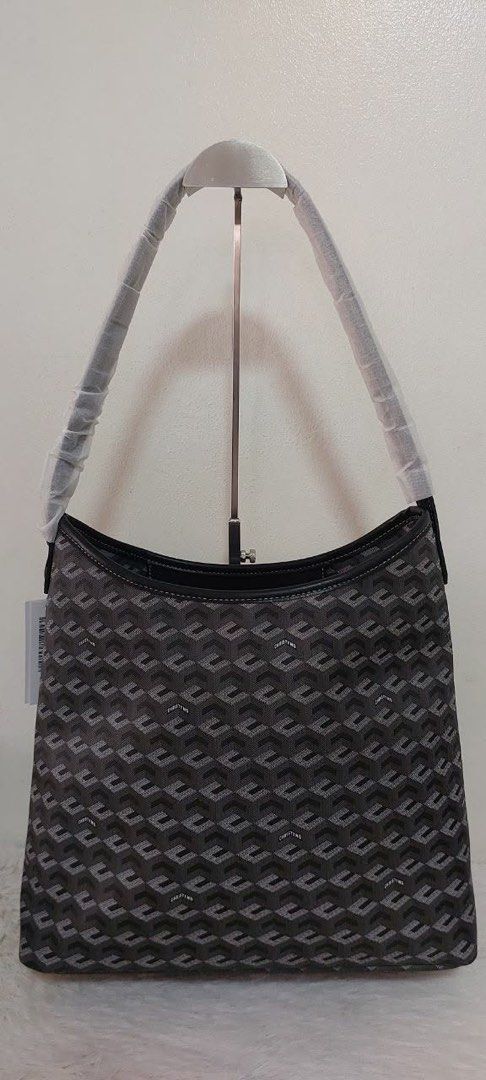 Alesso (Category: Luxury Bags & Wallets) located in Muntinlupa City. Submitted by mabelleadr46801 (Listing ID 1440523517, Image 3). Description: Christy Ng Alesso Large Bag - Brand new - Geometric pattern with black trim - Includes dust bag - Single shoulder strap - Spacious interior - Ideal for everyday use.