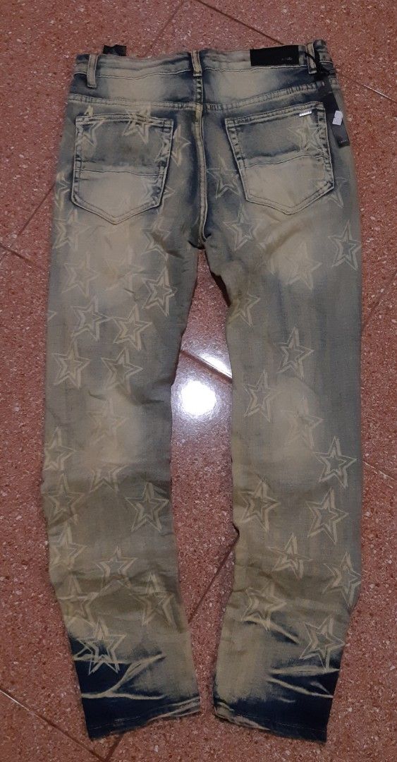 AMIRI Star Print Distressed Jeans (Category: Jeans) located in Malaybalay. Submitted by rielstuff (Listing ID 1440508439, Image 2). Description: Cool Amiri jeans with a star print all over. They have a distressed look with rips. The wash is a mix of blue and beige. Great statement piece for your wardrobe. Check out the details in the photos..