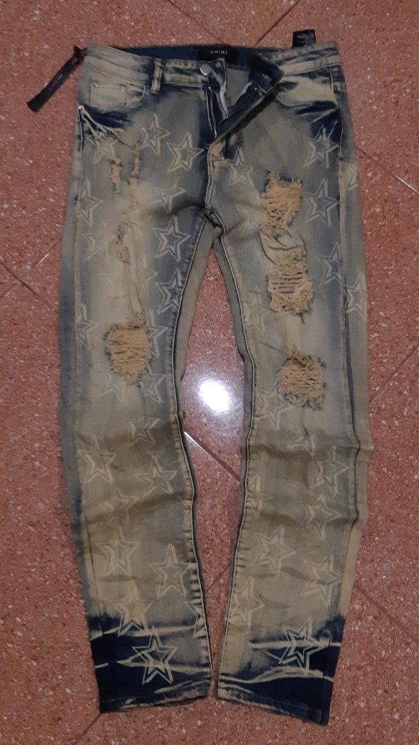 AMIRI Star Print Distressed Jeans (Category: Jeans) located in Malaybalay. Submitted by rielstuff (Listing ID 1440508439, Image 1). Description: Cool Amiri jeans with a star print all over. They have a distressed look with rips. The wash is a mix of blue and beige. Great statement piece for your wardrobe. Check out the details in the photos..