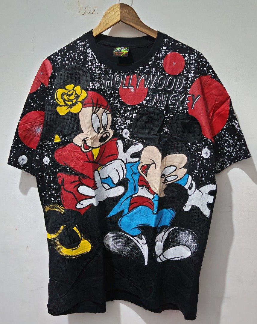 AOP Disney Hollywood Mickey & Minnie (Category: Tshirts & Polo Shirts ) located in Taguig. Submitted by thriftedminds (Listing ID 1440565272, Image 1). Description: Item: AOP Disney Hollywood Mickey & Minnie🔥 ‎Size: The Black ‎Width: 21.5 ‎Length: 28.5 ‎Condition: Excellent ‎Issue: Loose stitching on hem DM to purchase 📩.