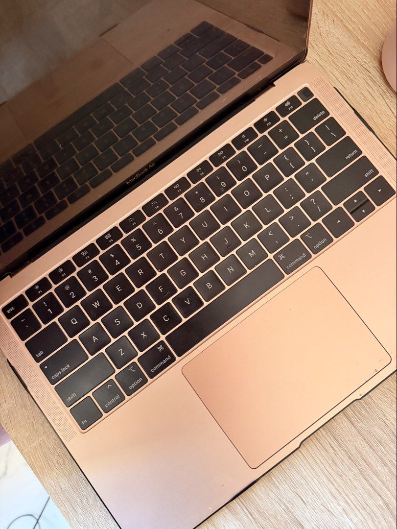 Apple MacBook Air 13-inch 2019 Rose Gold (Category: Laptops & Notebooks) located in Manila. Submitted by fabthrift2024 (Listing ID 1440549430, Image 3). Description: - Rose Gold 13-inch 2019 MacBook Air - 1.6 GHz Intel Core i5 Processor - 8 GB RAM - 1536 MB Intel UHD Graphics 617 - Runs on macOS Sonoma 14.8.5 - Comes with a glittery rose gold protective cover - Ideal for everyday use, school, or work.