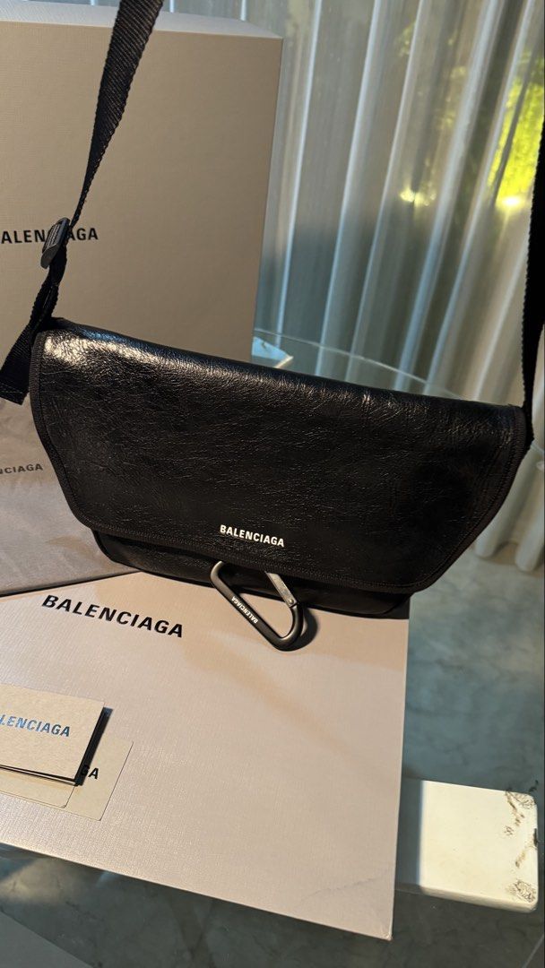 Balenciaga Explorer Flap Messenger Bag (Category: Luxury Bags & Wallets) located in San Fernando. Submitted by mnlt_o (Listing ID 1440512714, Image 2). Description: Purchased from the official Balenciaga Store in Daimaru Shinsaibashi, Osaka, Japan. Used not more than 5 times only and still in excellent condition, almost good as new. Perfect for everyday use with its sleek and timeless design. Includes: • Original paper bag • Tags/cards • Original