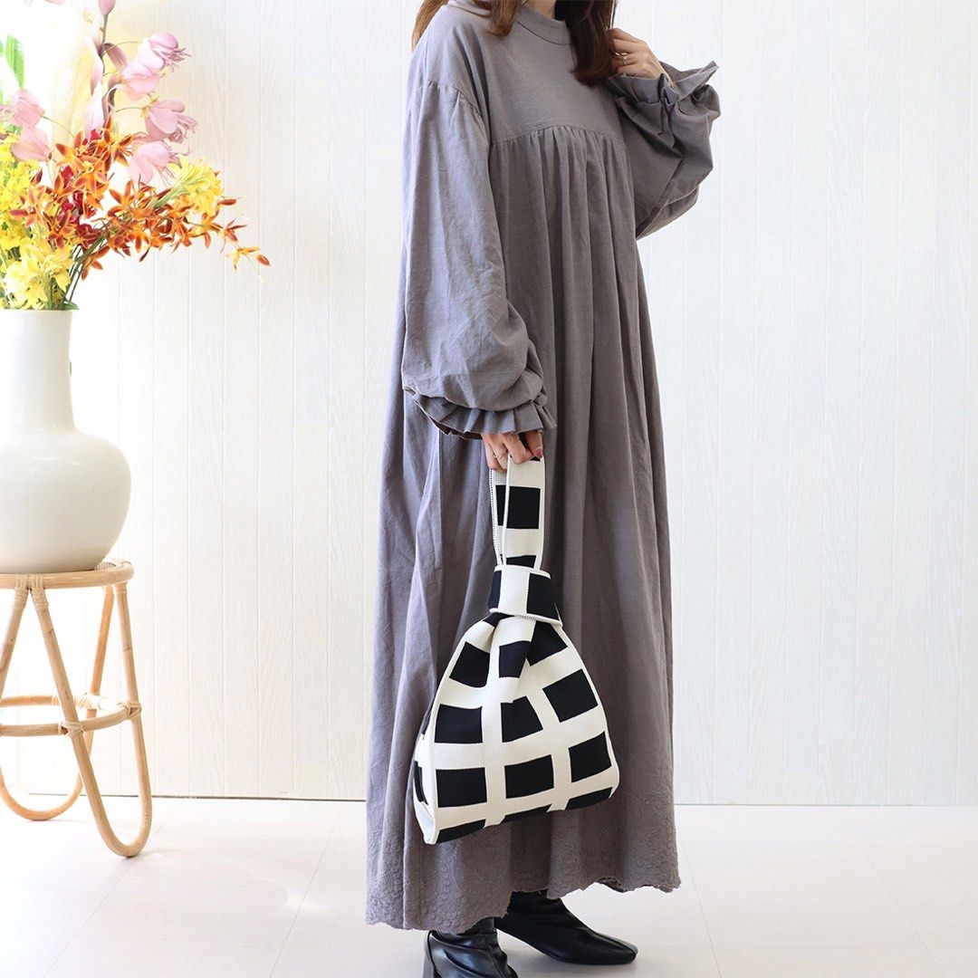 Black and White Checkered Knit Tote Bag (Category: Announcements) located in Manila. Submitted by starbalesukandjapansurplus (Listing ID 1440434976, Image 2). Description: - Stylish checkered knit tote bag in black and white. - Versatile wear: use as a shoulder bag or tie it up for a smaller handbag. - Ideal for groceries, shopping, or everyday essentials. - Crafted from soft, comfortable knit material. - Features a unique and eye-catching design