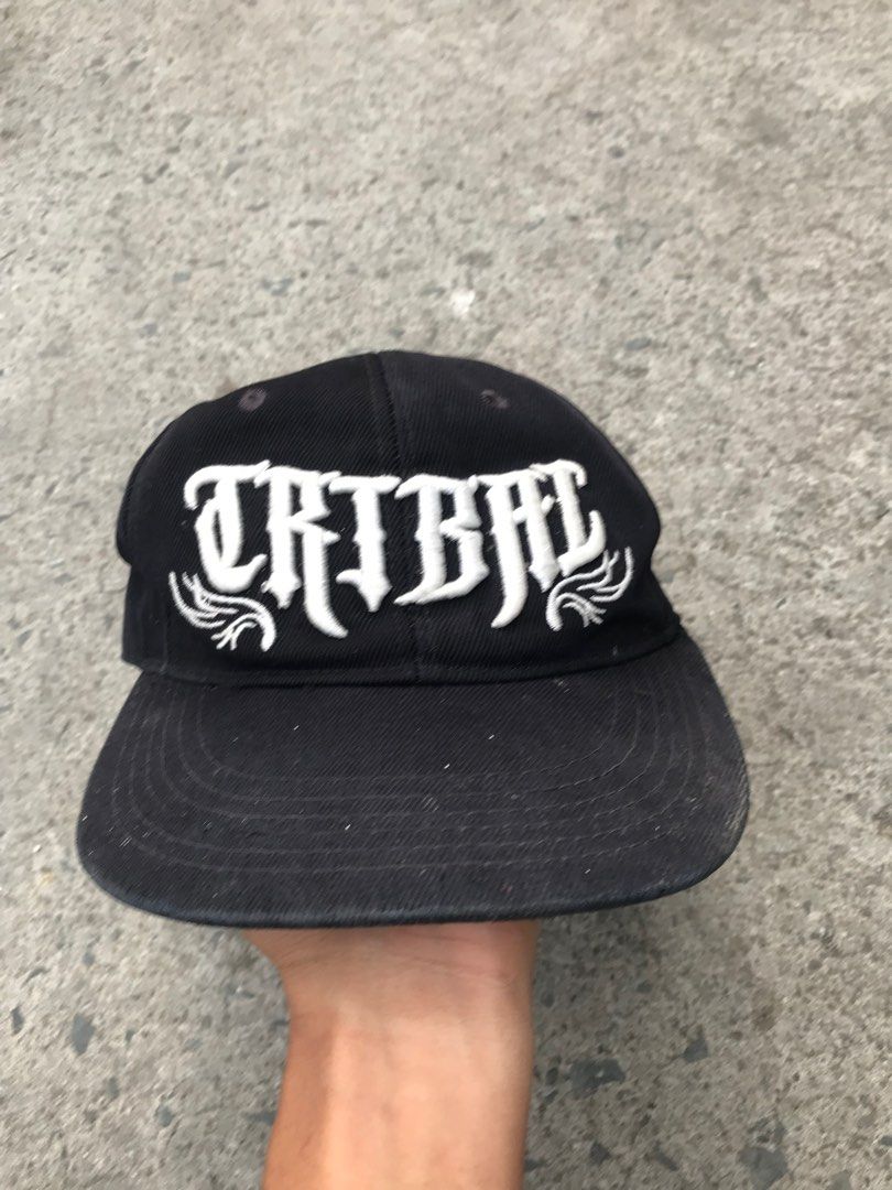 Black Cap with White "TRIBAL" Embroidery (Category: Caps & Hats) located in Imus. Submitted by chararatzx. (Listing ID 1440490387, Image 1). Description: Good Conditon Color rate 9/10 Location: Bacoor Cavite Courier jnt/lalamove Kindly check my fb account for vouch/assurance and safety Unli vouch .