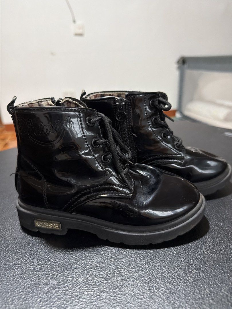 Black Patent Lace-up & Zip Boots (Category: Babies & Kids Fashion) located in San Mateo. Submitted by sweet_reesee (Listing ID 1440485939, Image 2). Description: - Cute black patent boots for kids - Easy on and off with laces and side zip - Stylish checkered lining inside - Versatile for everyday or dressy outfits Size 29.